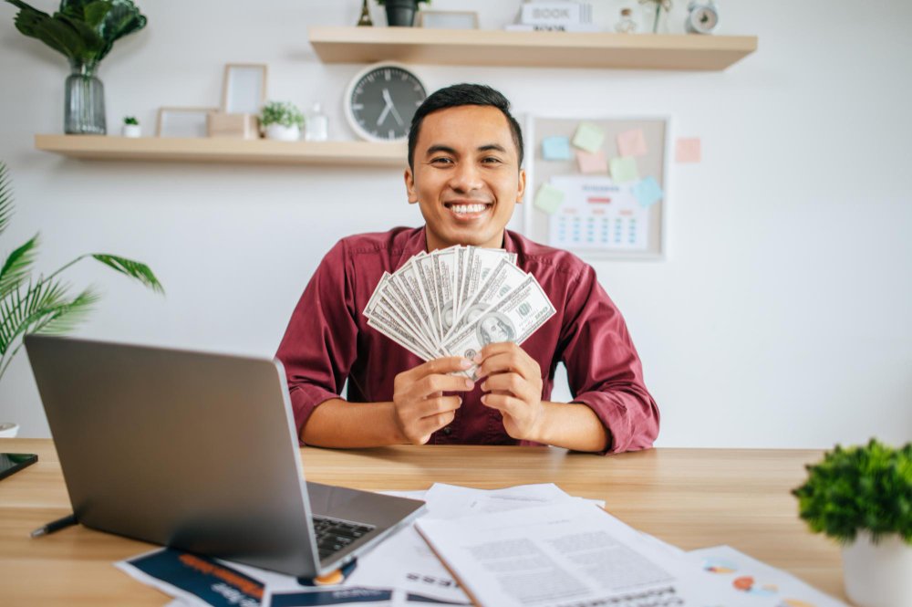 Latino business owner reviewing funding options with Business Access USA